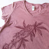 Closeup of the shirt with hemp flower graphic design