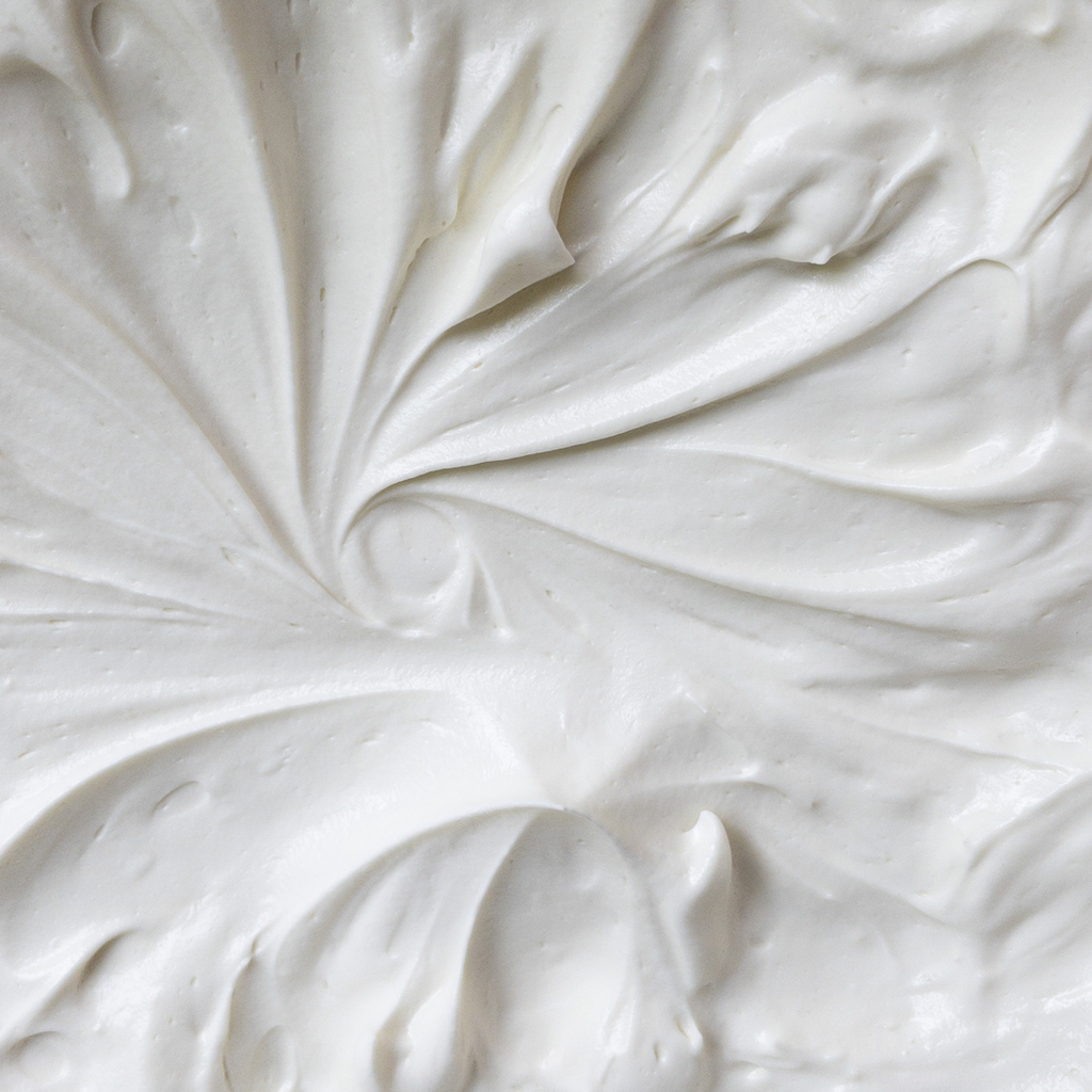 Closeup of the color and consistency of the Everyday Oasis Moisturizing Salve